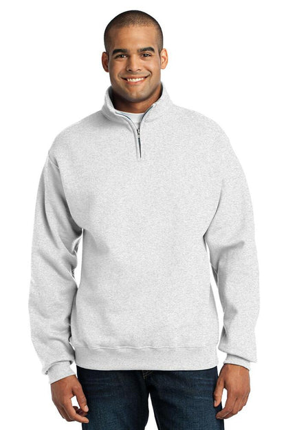 A man wearing a light gray heathered quarter-zip sweatshirt and dark blue jeans, standing against a solid white background.