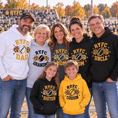 A family of seven wearing custom 'RYFC' themed hoodies and a t-shirt standing together on a football field. The group includes a grandfather, mother, father, mother, sister, cousin, and dad, all wearing matching apparel in white, gray, black, and yellow.